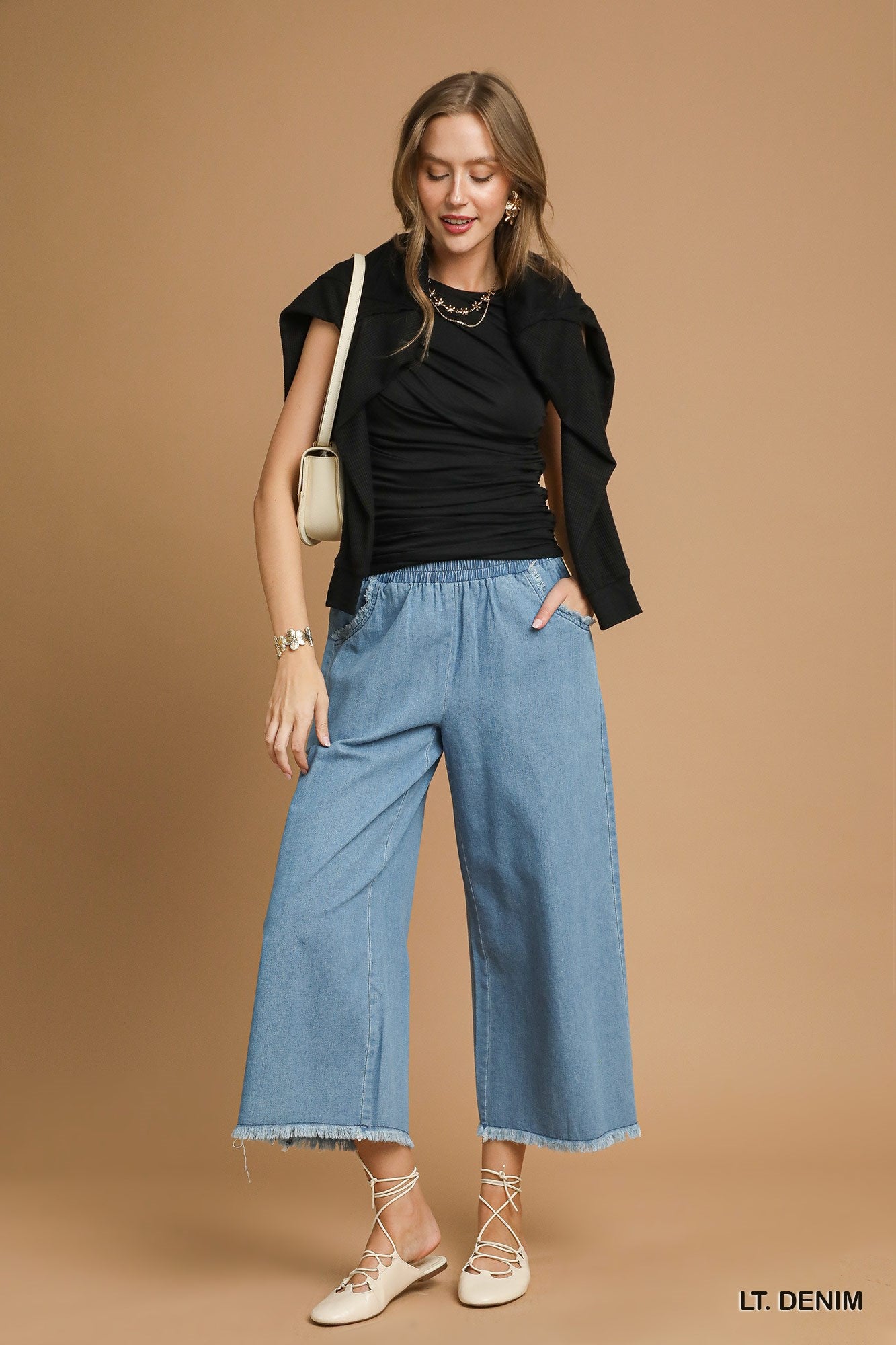 Washed Denim Pants with Fringe Hem